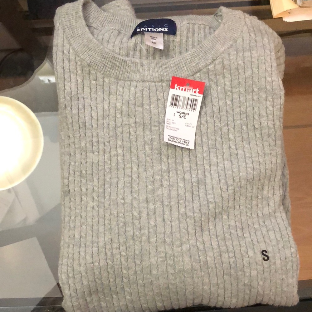 Grey and dark grey sweaters